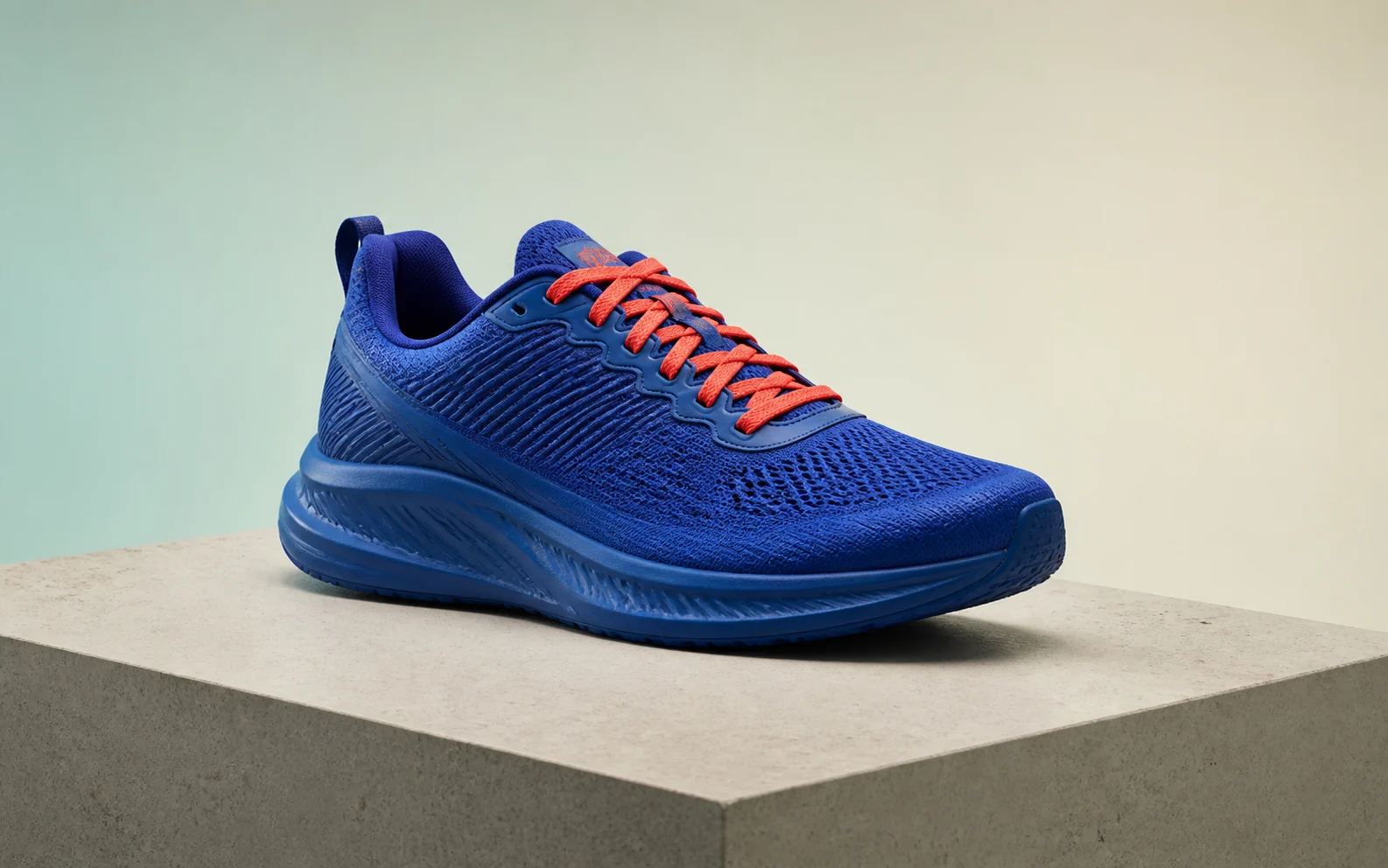 Blue running shoe product photo prepared for a visible Gemini logo removal example